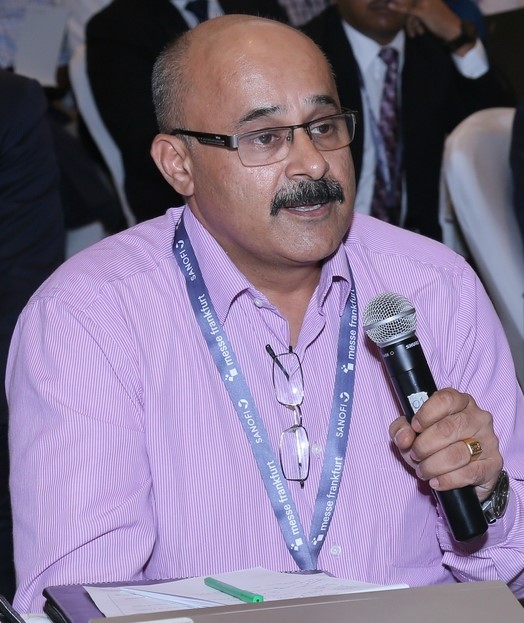 Dhyan Mayadas (with mic)